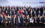 The OSCE youth ambassadors posing for a group photo with the foreign ministers at the Ministerial Council meeting in December 2014